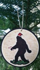 (3) SET OF 3 WOOD ORNAMENTS (3″ DIAMETER) SASQUATCH BIGFOOT MAN CAVE LOG CABIN