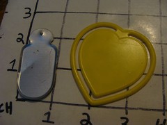 2 smokey the bear items plastic bookmark and metal item as shown