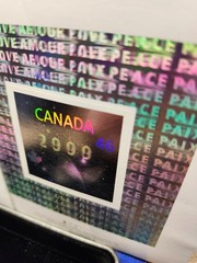 2000 Canada Post Official Millennium Keepsake sets. (2)