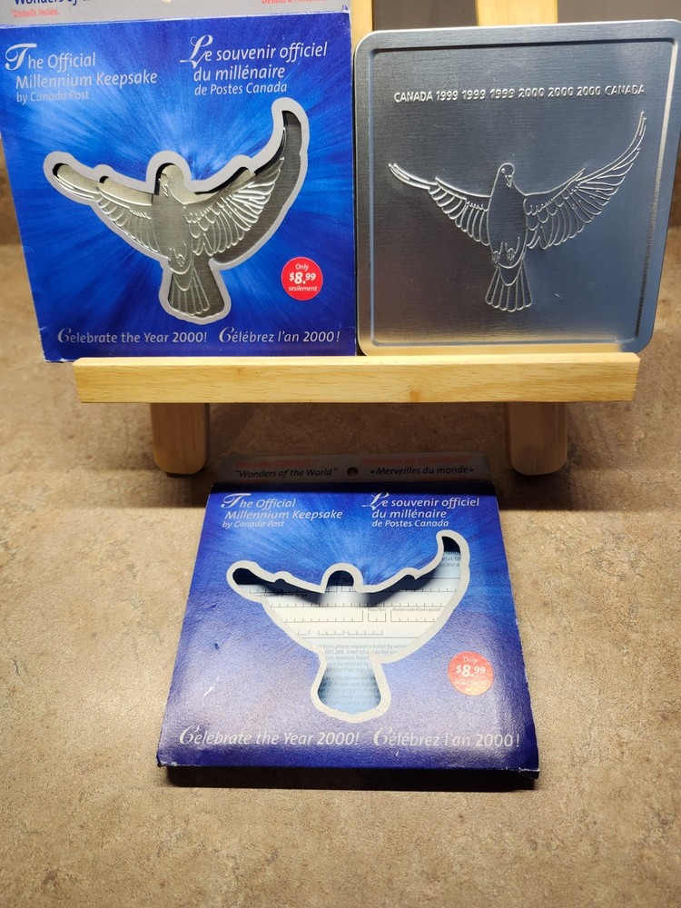 2000 Canada Post Official Millennium Keepsake sets. (2)