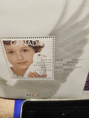 2000 Canada Post Official Millennium Keepsake sets. (2)