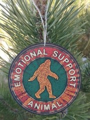 (3) SET OF 3 ASPEN WOOD ORNAMENTS (3″ DIAMETER) SASQUATCH BIGFOOT MAN CAVE CABIN