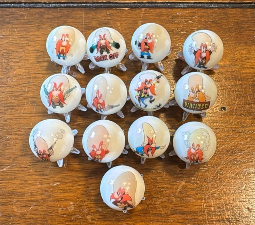 Yosemite Sam 5/8 size glass marbles with stands